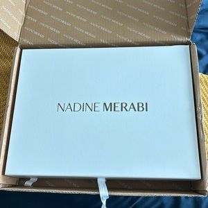 Nadine Merabi empty box
